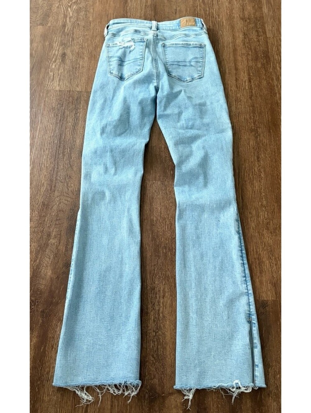 American Eagle Next Level Flare Jeans Womens 0 Light Wash Distressed Hem Zero - Picture 2 of 4